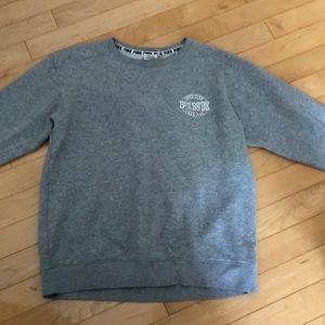 gray sweater from pink